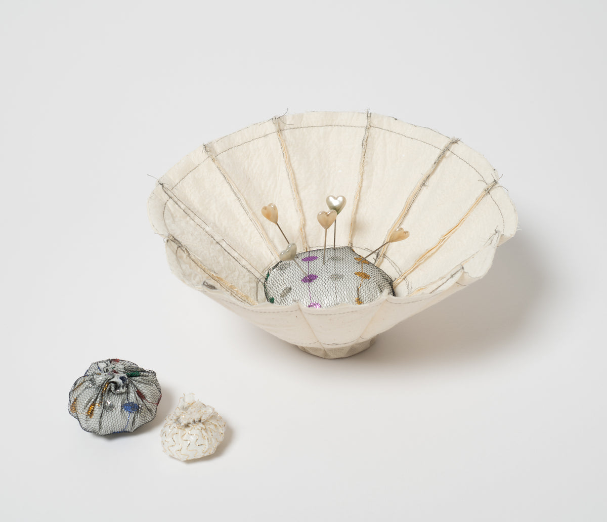 Flowering Pincushion with Vessels